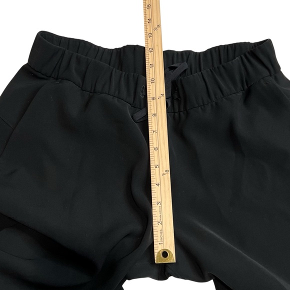 Lululemon On the Fly Wide-Leg 7/8 Pant Woven Black Pants Pockets 5BQPS size 8 - Picture 4 of 13